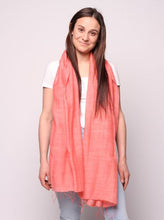 Load image into Gallery viewer, Woman wearing coral colored scarf