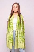 Load image into Gallery viewer, Woman wearing golden lime scarf with green pattern
