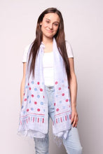 Load image into Gallery viewer, Woman wearing periwinkle scarf with blue and red dots
